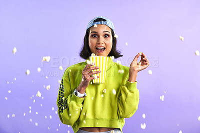 Buy stock photo Surprise, wow and woman with popcorn for a movie or streaming service or cinema and in studio against a purple background. Video, entertainment and film or television or omg and snack on mock up