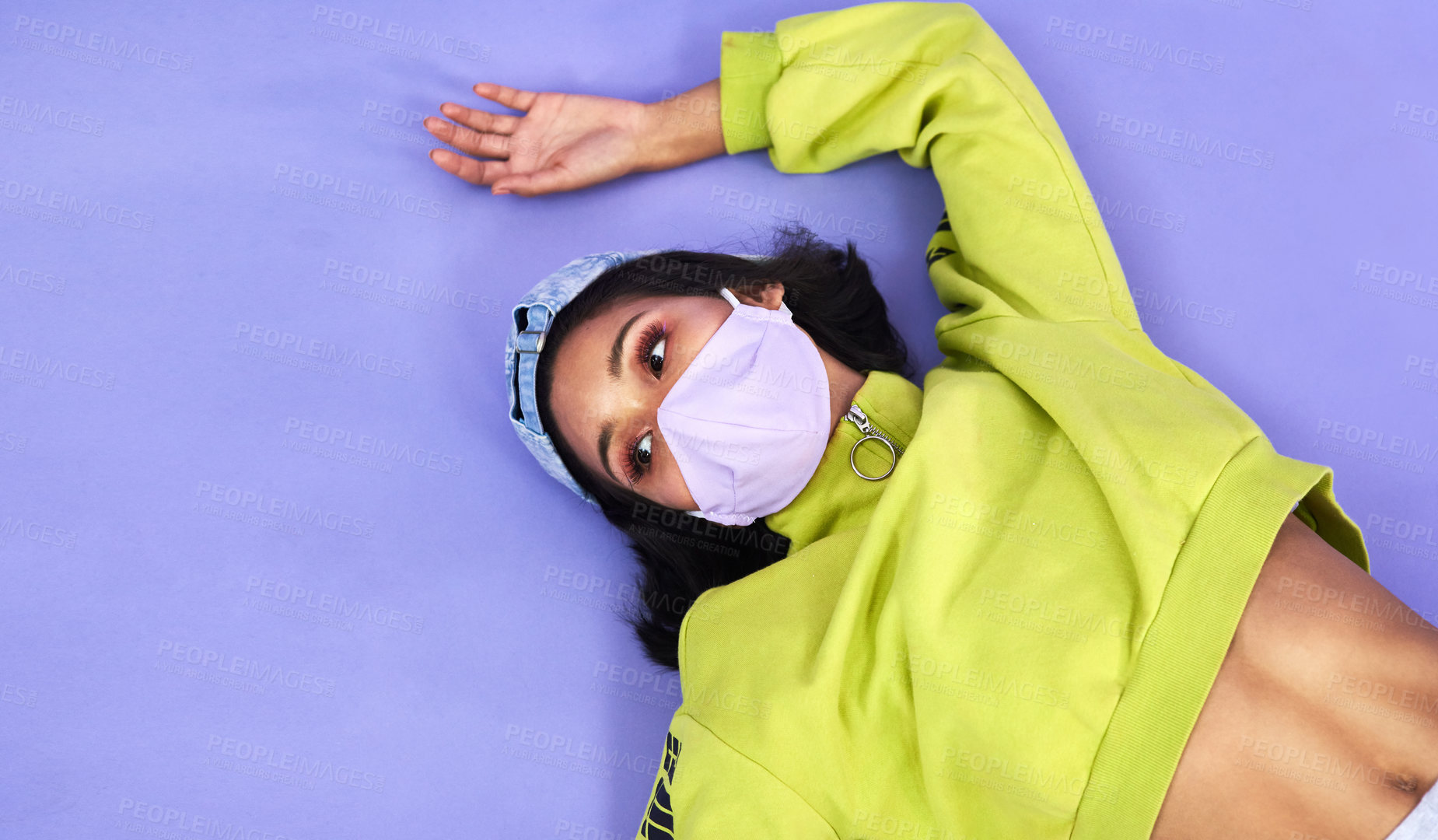 Buy stock photo Woman, face mask and safety in studio for danger, allergy and virus with retro fashion. Gen z, social distancing and memory on floor for outfit, style and mockup space for risk by purple background