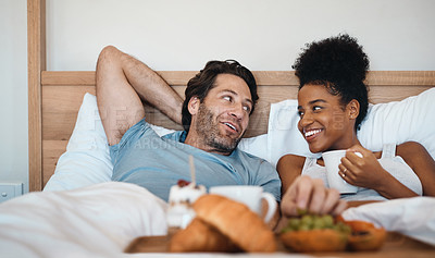 Buy stock photo Valentines surprise, birthday or interracial couple celebrate womens day breakfast in bed by a romantic, husband for his wife together. Sweet, in love and loving man serving his lady food and bonding