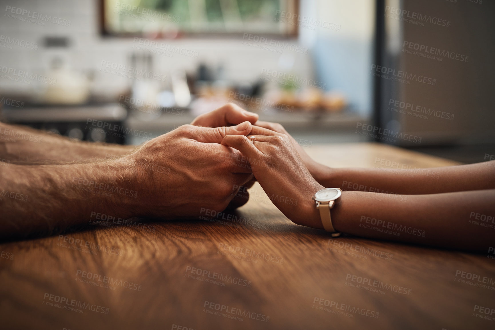 Buy stock photo Couple, love and trust with holding hands on table for emotion support, empathy and kindness for connection. Man, woman and solidarity gesture for comfort for loss, home and strength in unity.