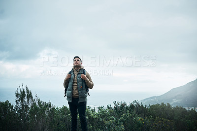 Buy stock photo Hiking, thinking and relax with man on mountain for explore, travel and adventure. Challenge, wellness and holiday with person and trekking in nature for backpacking, fitness and camping vacation