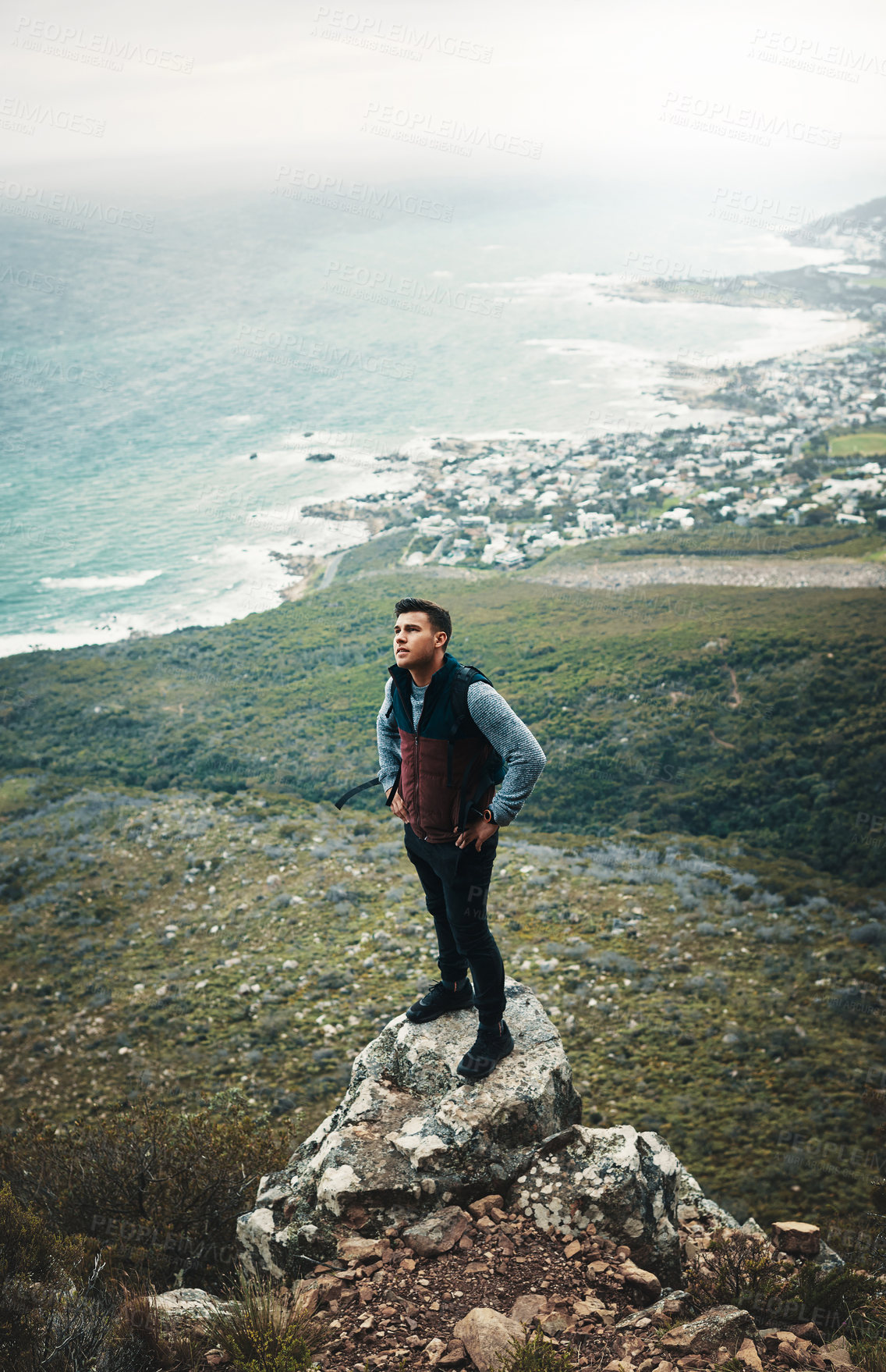 Buy stock photo Hiking, thinking and rocks with man on mountain for explore, travel and adventure. Challenge, wellness and holiday with person and trekking in nature for backpacking, relax and camping vacation