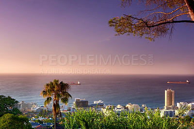 Buy stock photo Landscape view of ocean with cargo ships, tropical trees and urban cityscape in famous travel or tourism destination with residential houses. Scenic view from Signal Hill in Cape Town, South Africa 