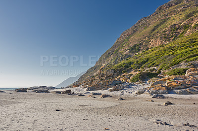 Buy stock photo Copyspace landscape view of the rocky coast of Western Cape in South Africa. Beautiful scenery on the seashore at the beach during summer in a popular tourist city. Natural environment of the ocean