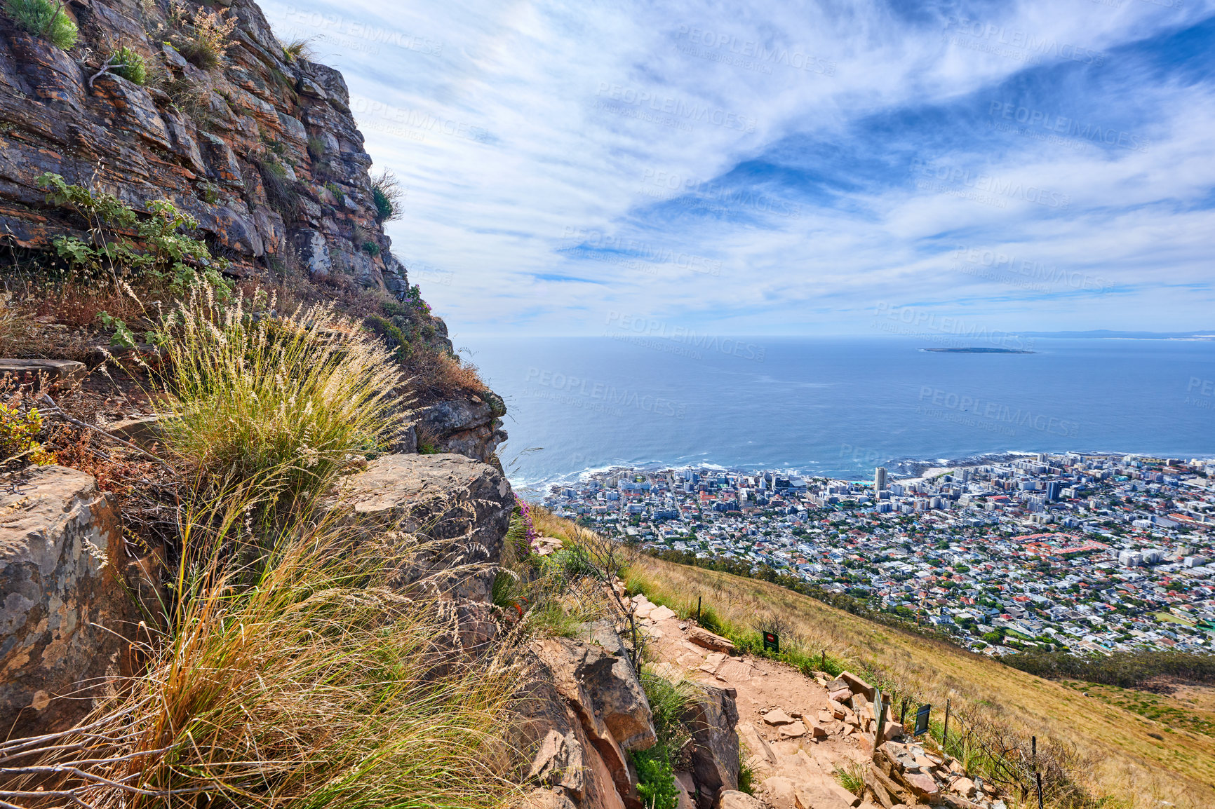 Buy stock photo Shot of the mountain meeting the ocean