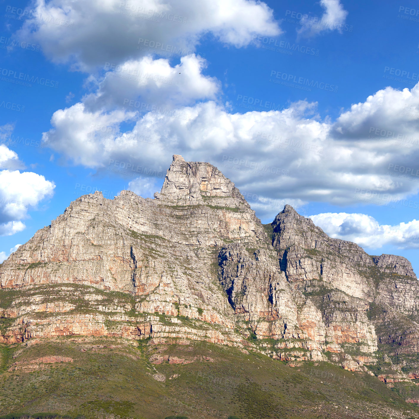 Buy stock photo Rocky mountain landscape with green pasture against a blue sky with copyspace. A popular travel destination for tourists and hikers to explore. View of Table Mountain in Cape Town, Western Cape