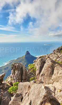 Buy stock photo Aerial view of table Mountain in South Africa on a sunny day with copy space. Peaceful morning with views of the blue ocean and Lions Head in Cape Town. Tranquil, serene and calming harmony in nature