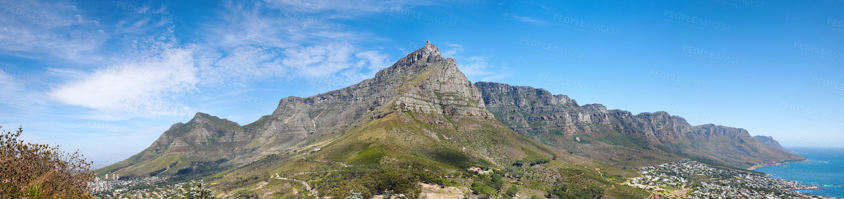 Buy stock photo Landscape of a mountain against a blue sky with copyspace. A popular travel destination for tourists and hikers to explore. View of Table Mountain and the twelve apostles in Cape Town, Western Cape