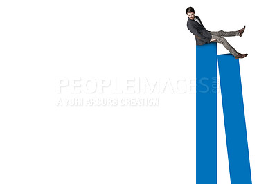 Buy stock photo Shot of a businessman balancing on top of a graph against a white background