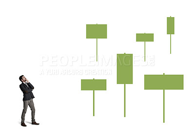 Buy stock photo Shot of a businessman looking thoughtfully at signs against a white background