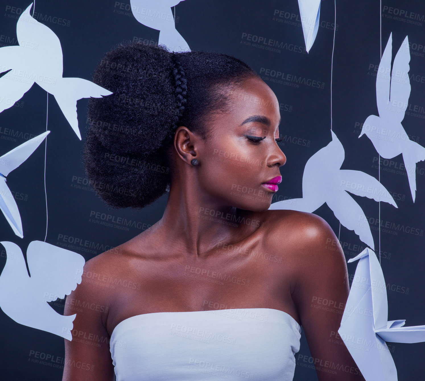 Buy stock photo African woman, creative and beauty with paper birds for art, fashion and confidence or empower in studio. Black model, fantasy and makeup with origami for decor, design and cross cultural diversity