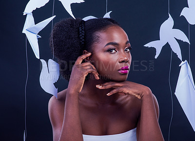 Buy stock photo African woman, portrait and creative beauty with paper birds for art, fashion and confidence in studio. Black model, fantasy and makeup with origami for decor, design and cross cultural diversity