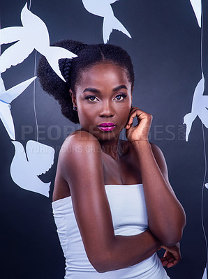Buy stock photo Black woman, portrait and creative beauty with origami for art, fashion and confidence in studio. African model, fantasy and makeup with paper birds for decor, design and cross cultural diversity