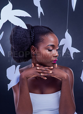 Buy stock photo Paper, birds and black woman for makeup, beauty and cosmetics with vision isolated on gray background. Thinking, African girl and serious for skincare, cosmetology and dermatology in studio backdrop