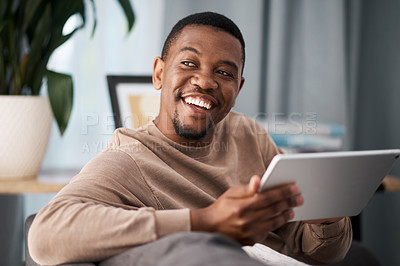 Buy stock photo Black man, digital tablet and social media, living room home and streaming app, reading ebook or online shopping on technology. Happy guy, wifi connection and relax in lounge, wifi internet and ideas