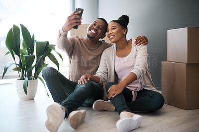 Buy stock photo Black couple, phone and smile for selfie, moving in or real estate, property or new home together. Happy African American man and woman smiling in happiness or satisfaction for photo and buying house