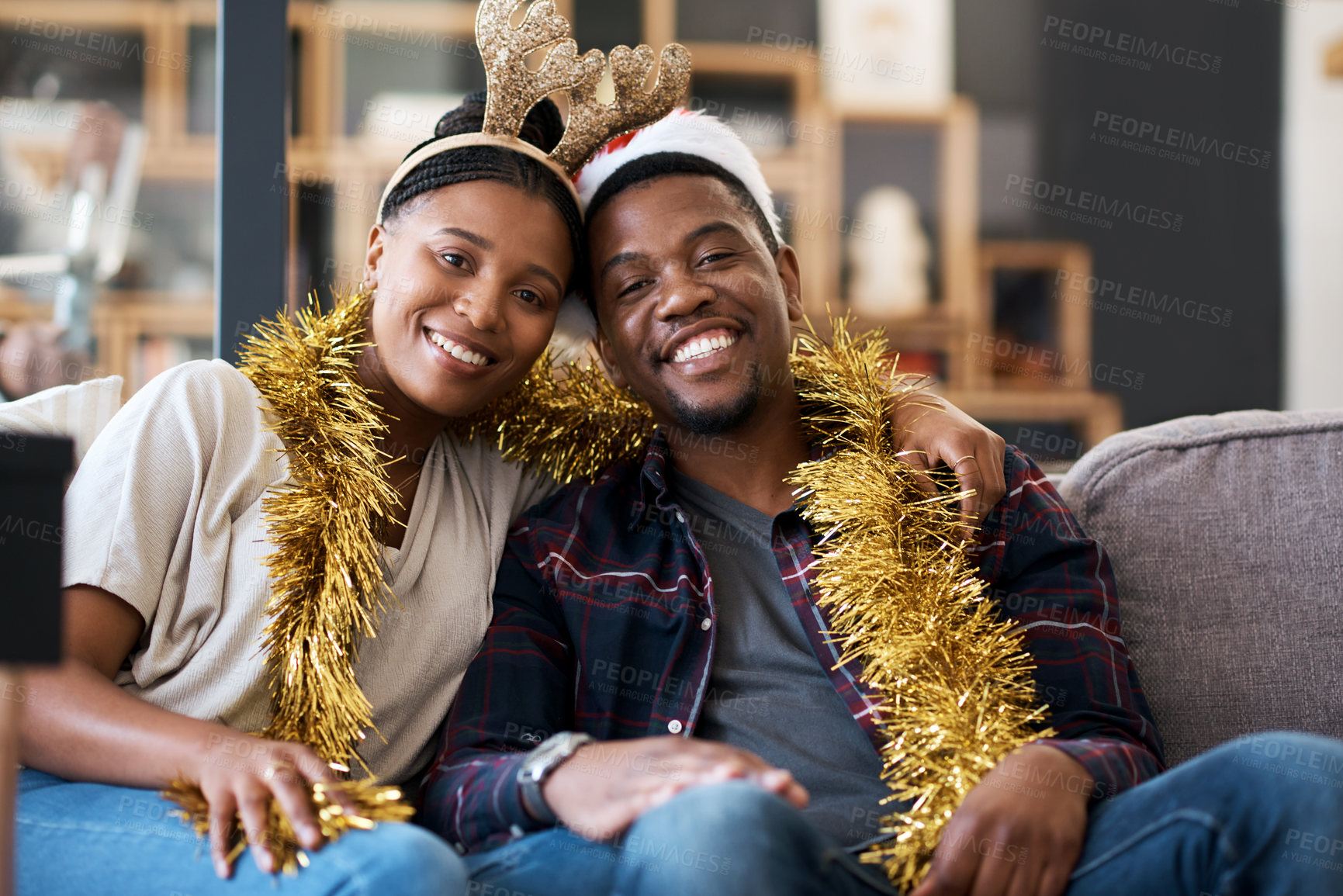 Buy stock photo Christmas, happy and portrait of black couple on sofa with decoration for celebration, festive and holiday. Xmas, smile and gratitude with man and woman in living room at home for vacation and love