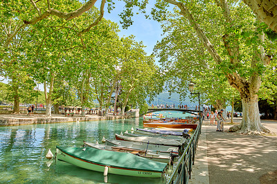 Buy stock photo Annecy, France, July, 17, 2019: Houses and street life in the famous medieval part of the city of Annecy, Department of Upper Savoy, France.