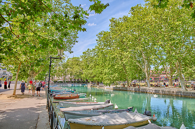 Buy stock photo Annecy, France, July, 17, 2019: Houses and street life in the famous medieval part of the city of Annecy, Department of Upper Savoy, France.