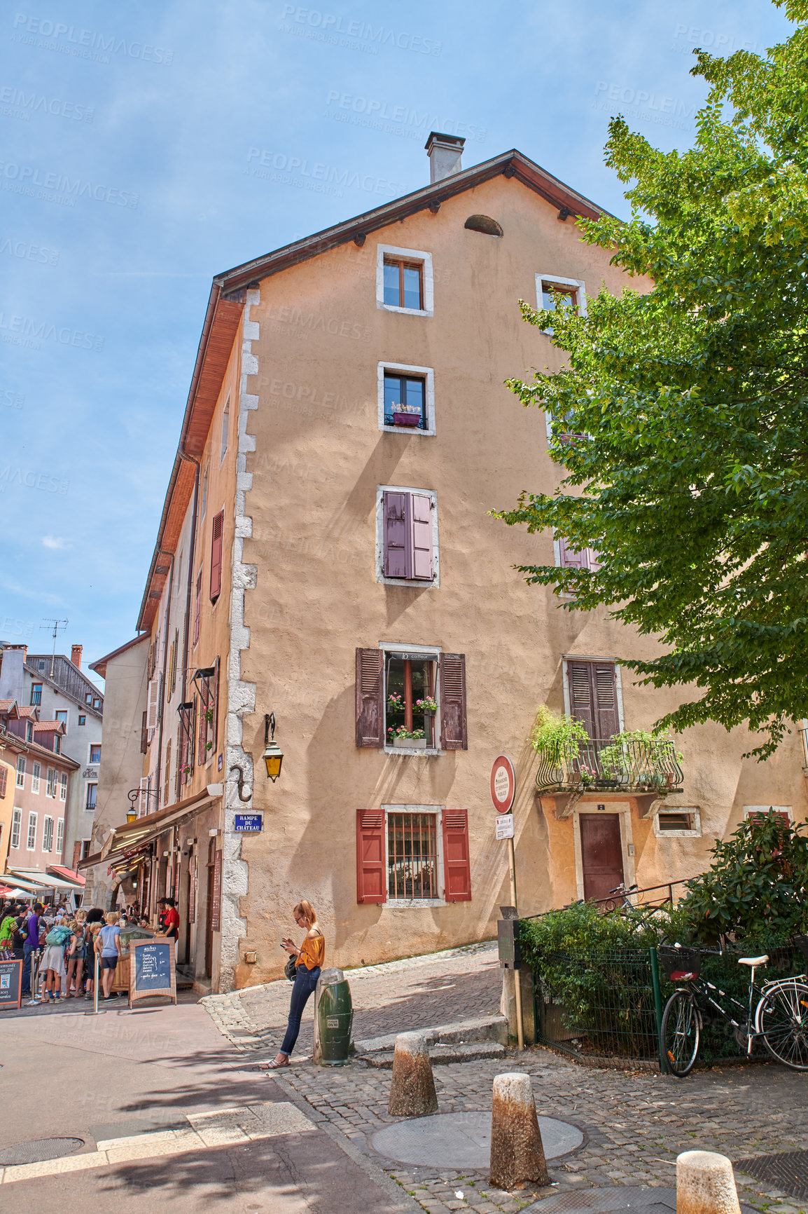 Buy stock photo Annecy, France, July, 17, 2019: Houses and street life in the famous medieval part of the city of Annecy, Department of Upper Savoy, France.