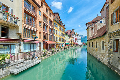 Buy stock photo Annecy, France, July, 17, 2019: Houses and street life in the famous medieval part of the city of Annecy, Department of Upper Savoy, France.