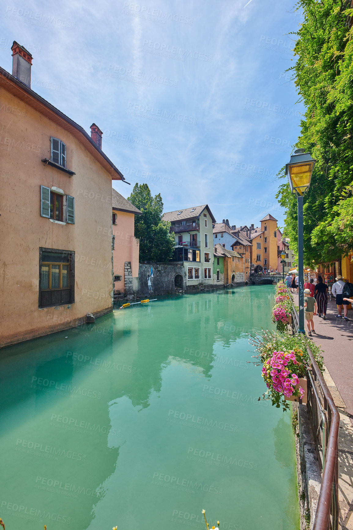 Buy stock photo Annecy, France, July, 17, 2019: Houses and street life in the famous medieval part of the city of Annecy, Department of Upper Savoy, France.