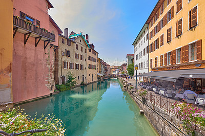 Buy stock photo Annecy, France, July, 17, 2019: Houses and street life in the famous medieval part of the city of Annecy, Department of Upper Savoy, France.