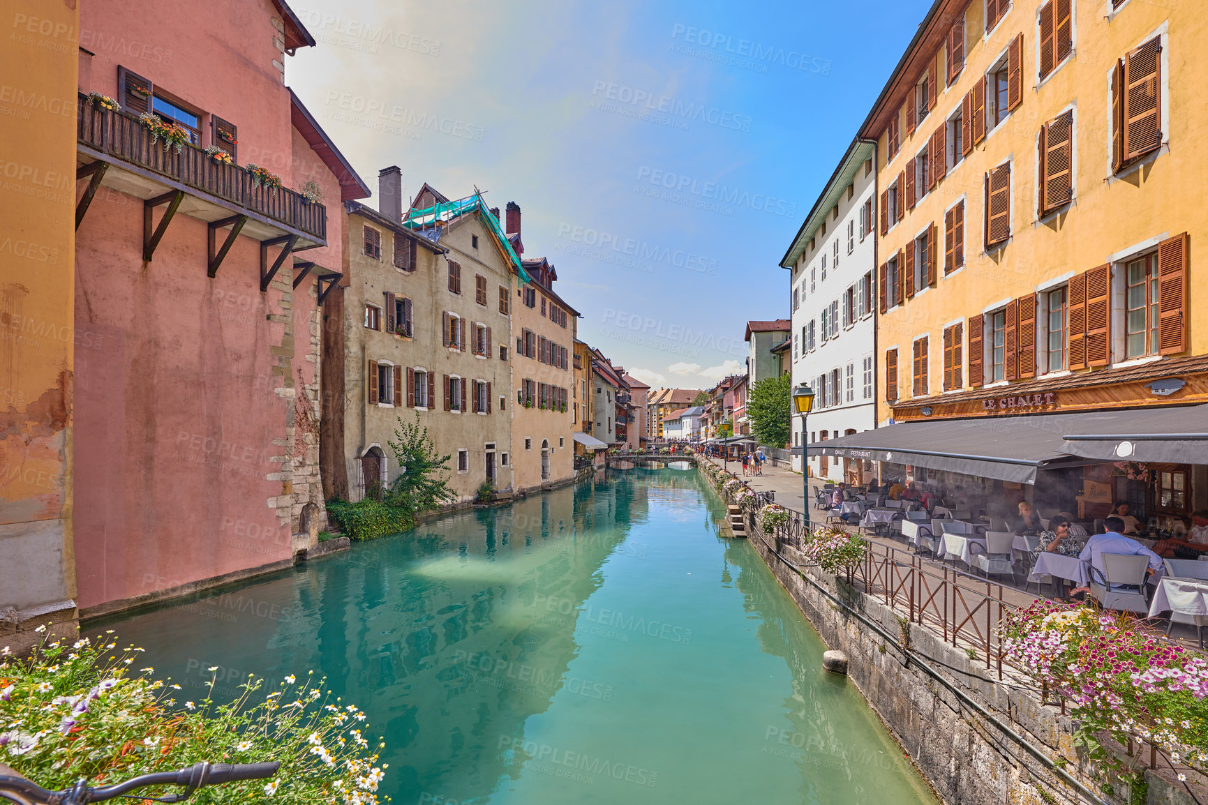 Buy stock photo Annecy, France, July, 17, 2019: Houses and street life in the famous medieval part of the city of Annecy, Department of Upper Savoy, France.