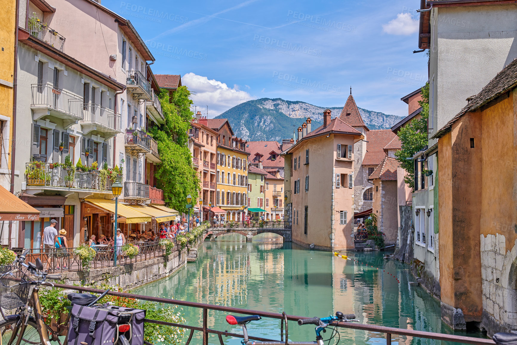 Buy stock photo Travel, canal or tourists in town with holiday, foreign lake or vintage style in architecture. Vacation, downtown or people outdoor with river, classic structure or village marketplace in France.