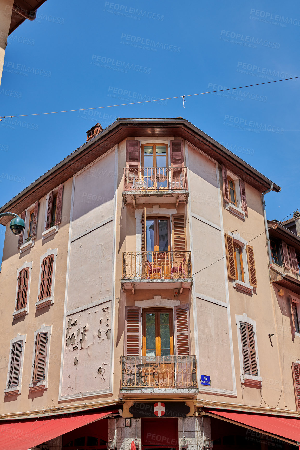 Buy stock photo Annecy, France, July, 17, 2019: Houses and street life in the famous medieval part of the city of Annecy, Department of Upper Savoy, France.