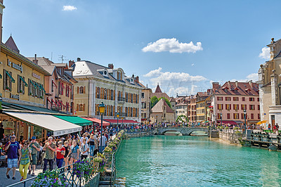 Buy stock photo Annecy, France, July, 17, 2019: Houses and street life in the famous medieval part of the city of Annecy, Department of Upper Savoy, France.