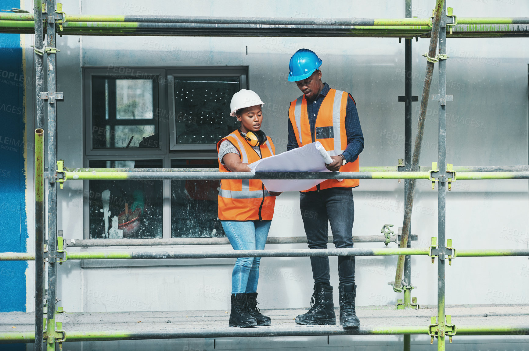 Buy stock photo Construction site, business people and blueprints with teamwork, scaffolding and planning with safety. Employees, man and woman with documents, progress and engineering with architecture and planning