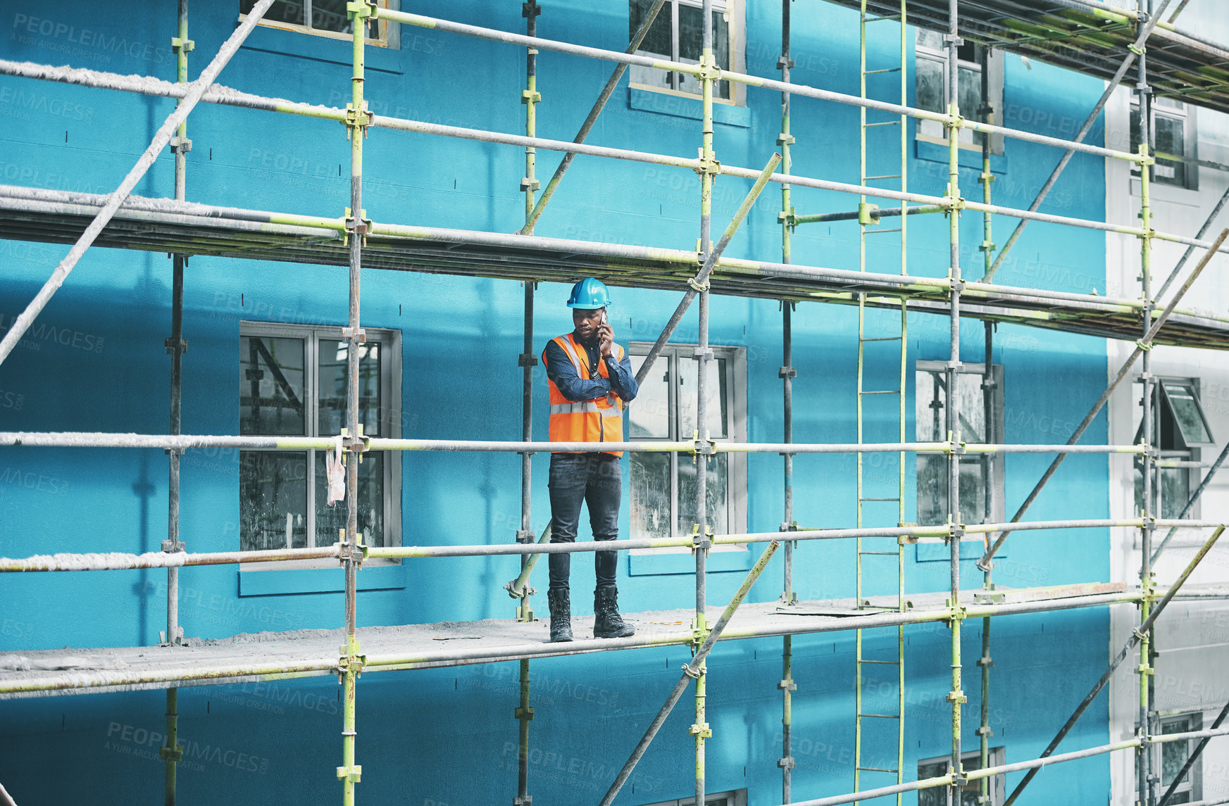 Buy stock photo Planning, construction and man on scaffolding with phone call, communication and architecture. Property developer, contractor or project manager at site on smartphone for civil engineering inspection