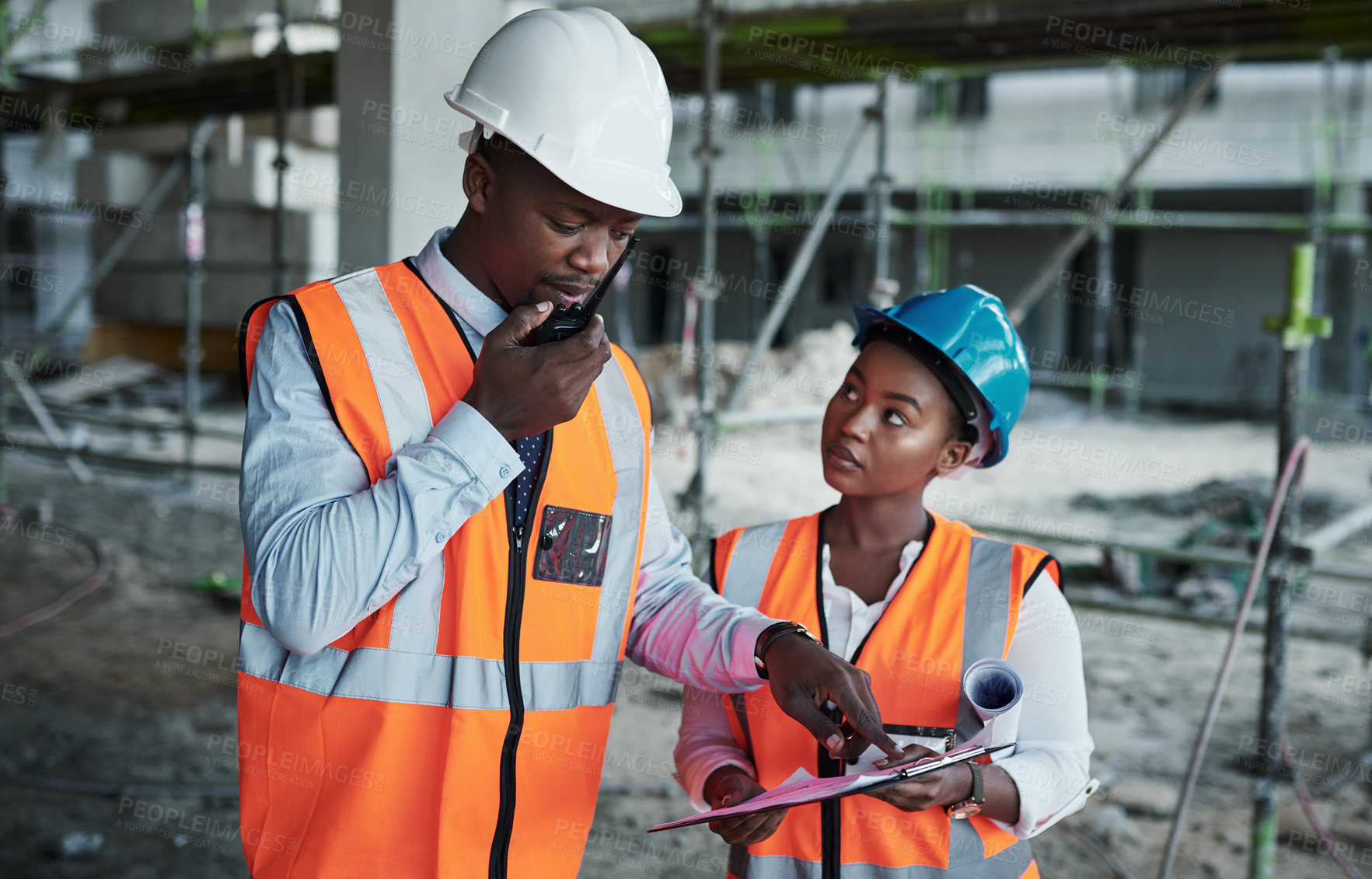 Buy stock photo People, paperwork and team conversation at construction site, walkie talkie and checklist for plan. Employees, engineering and assessment of infrastructure, safety gear and outdoor for inspection