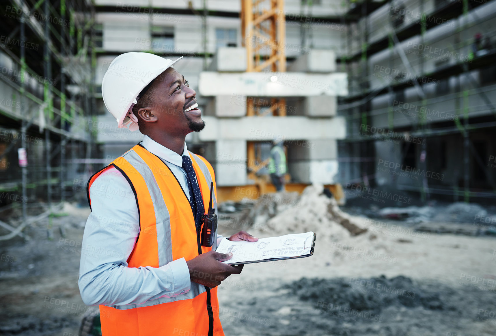 Buy stock photo Happy, black man and civil engineer with clipboard for inspection, planning or site construction in city. Young African, male person or architect with checklist for architecture or industrial project