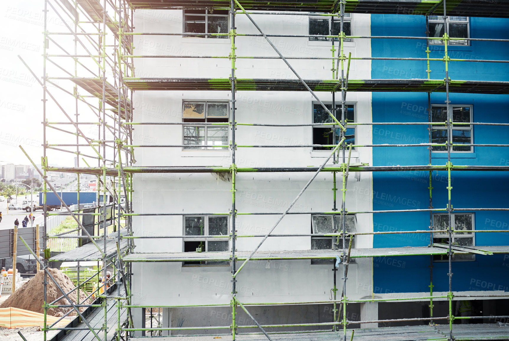 Buy stock photo Shot of scaffolding and a building at a construction site