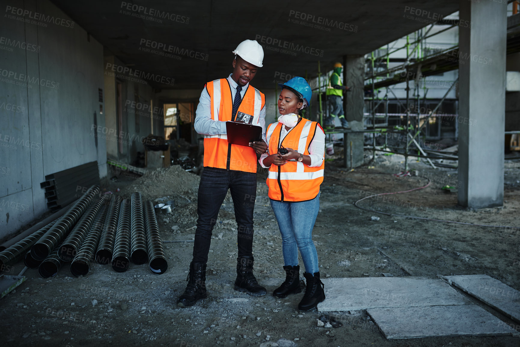 Buy stock photo Construction site, architecture and black woman with clipboard for planning, maintenance and contractor. Engineering, teamwork and manager with face mask for safety, discussion and building checklist