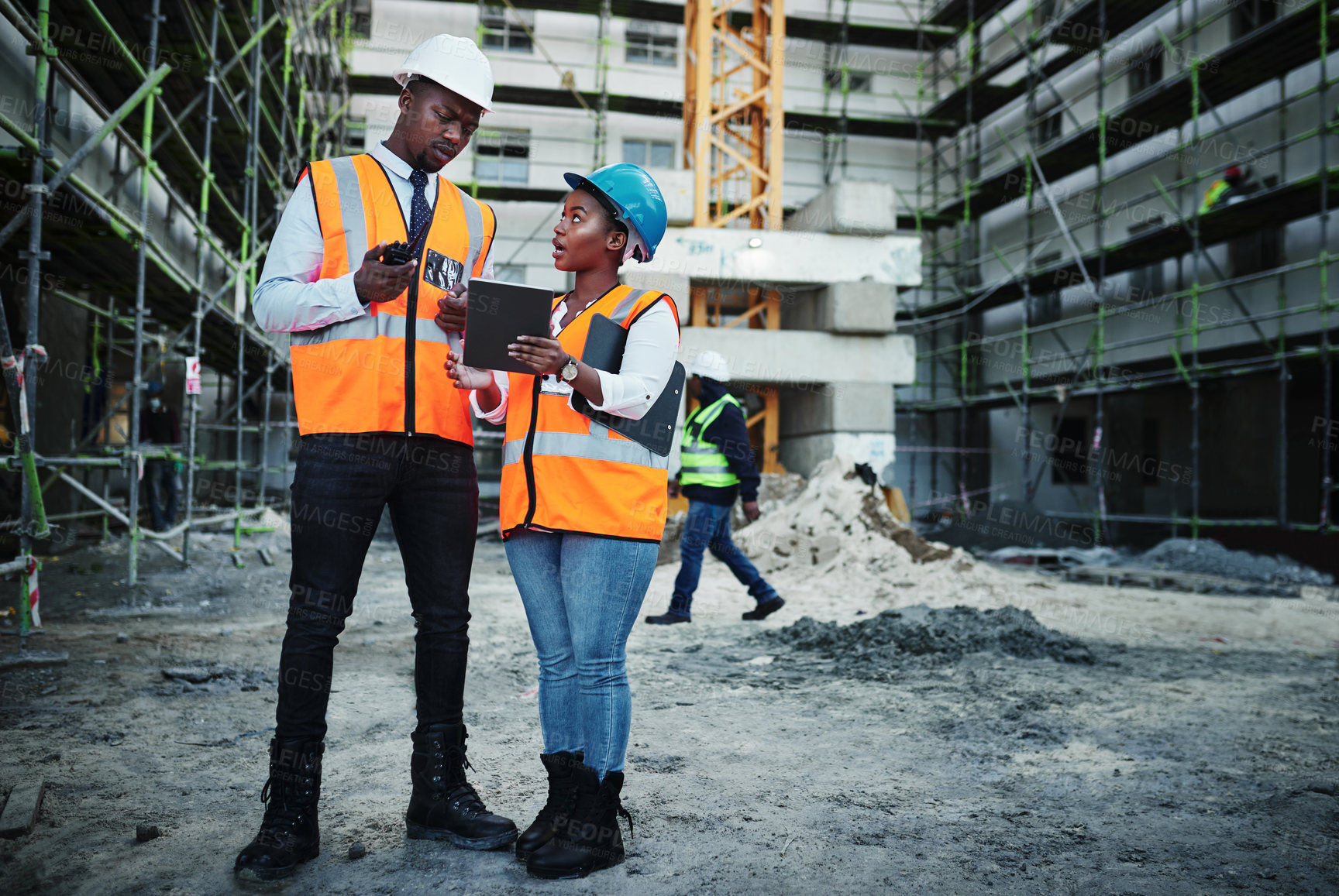 Buy stock photo Construction site, discussion and black people with tablet for building, maintenance and contractor. Engineering, teamwork and manager with helmet for safety, architecture and radio for communication