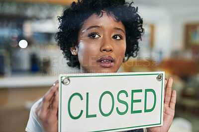 Buy stock photo Sad woman, face and closed sign on window at cafe in small business, bankruptcy or fail. Female person or waitress holding billboard in store debt, financial crisis or out of service and closing shop