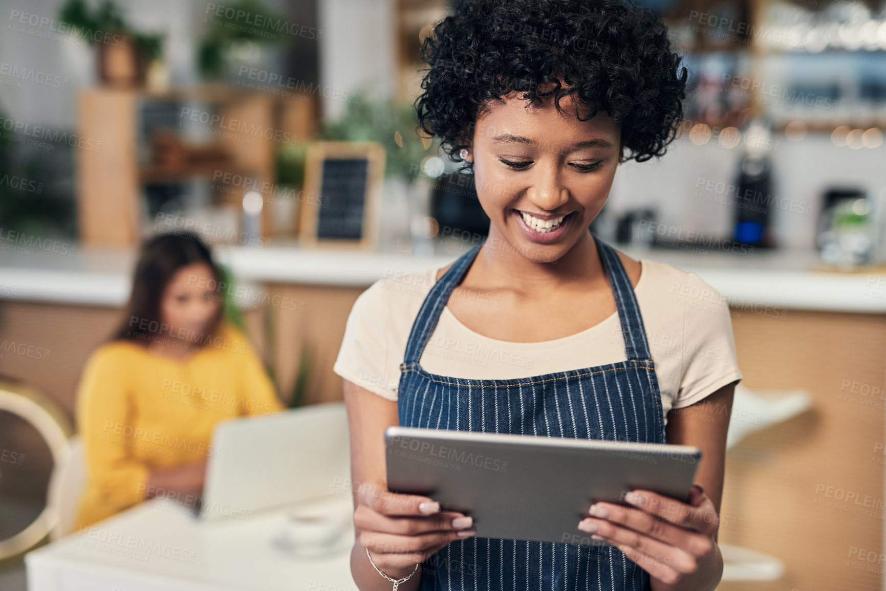 Buy stock photo Coffee shop, woman and tablet with waitress, apron and digital check for customer order online. Smile, cafe and restaurant with technology of small business owner or barista with website sales on app