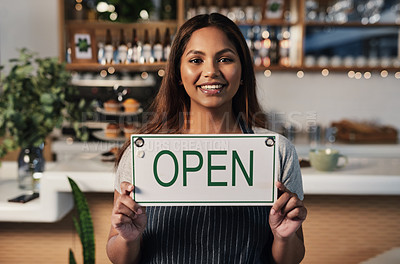 Buy stock photo Happy woman, open sign and portrait at cafe of small business owner or waitress for morning or ready to serve. Female person or restaurant server holding board for coffee shop or cafeteria opening