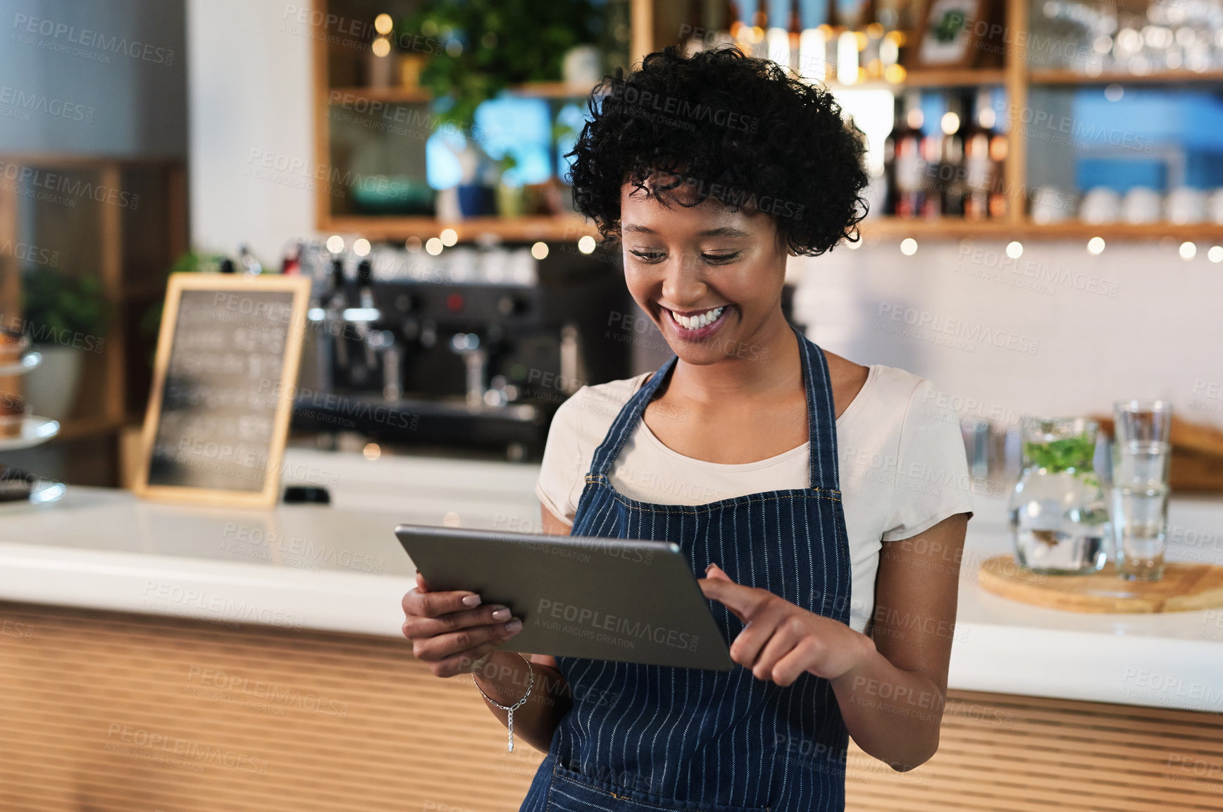 Buy stock photo Happy woman, tablet and waitress at cafe for order, inventory or checking stock at restaurant. Female person, barista or employee on technology in small business for online service at coffee shop
