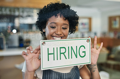 Buy stock photo Happy woman, hiring sign and window at cafe in small business for growth, advertising or billboard. African female person at restaurant holding board for hire message or recruiting at coffee shop