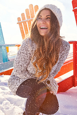 Buy stock photo Shot of a beautiful woman spending time outdoors in the snow