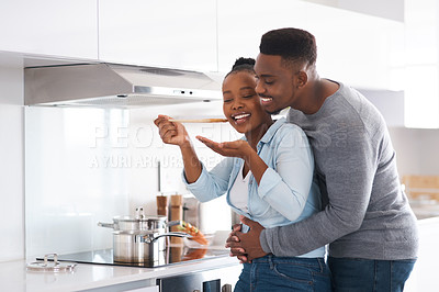 Buy stock photo Cooking, hug and black couple in kitchen, love and bonding together with happiness, romance and taste. House, embrace and African man with woman, ingredients and relationship with fun, food and smile