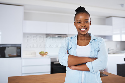 Buy stock photo Smile, confidence and portrait of black woman in kitchen with new home loan, mortgage plan and pride in house. Relax, real estate and happy face of homeowner in modern apartment with arms crossed