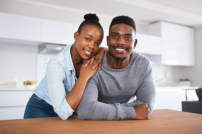 Buy stock photo Portrait of an affectionate couple spending time together at home