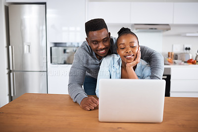 Buy stock photo Black couple, laptop and bonding with smile, video call and home with care or happiness in marriage. African man, woman and internet search together with romance in house, apartment and weekend relax