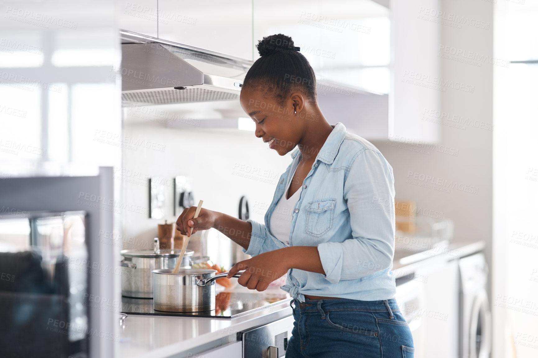 Buy stock photo Black woman, cooking and stove in kitchen, meal preparation and stir pot in home. Female person, healthy food and ingredients for lunch nutrition, heat process and culinary diet for detox wellness