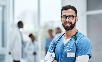 Buy stock photo Portrait of a young medical practitioner standing in a hospital